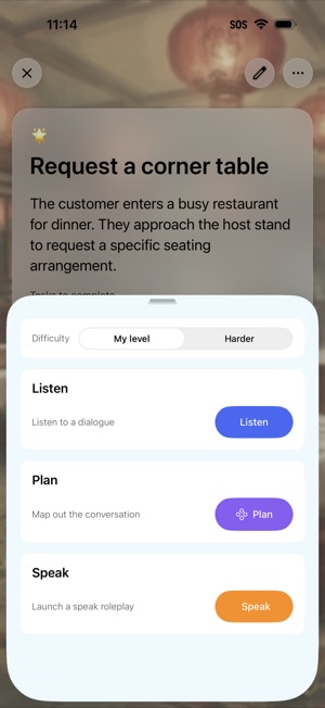 A scenario brief titled Request a corner table, describing a customer entering a busy restaurant, above a sheet offering three ways in — Listen to a dialogue, Plan the conversation, or Speak a roleplay — with a difficulty toggle set to My level.
